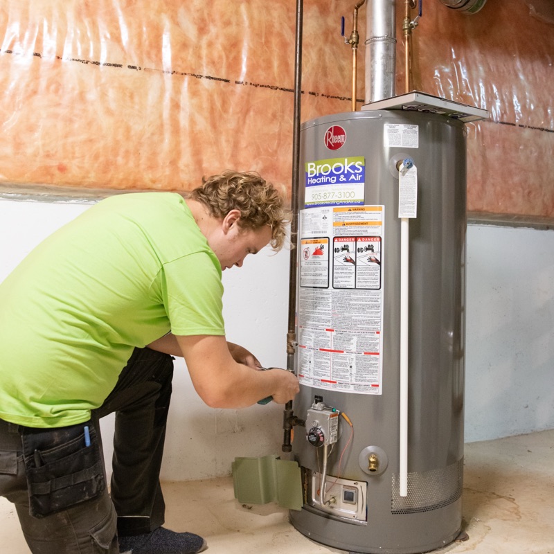 Brooks technician replacing a residential water heater